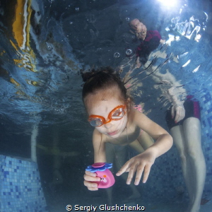 Children swimming by Sergiy Glushchenko 